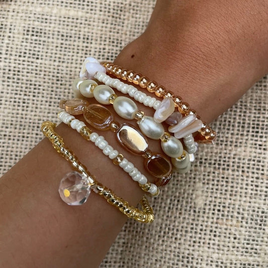 Golden Radiance: A Pearl-Infused Bracelet Stack